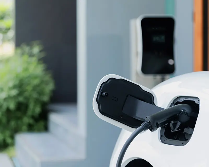 Electric vehicle charging from a wall-mounted Level 2 home charger