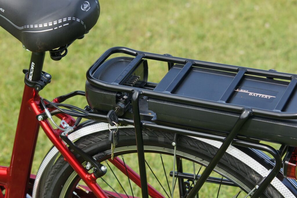 Lithium-ion battery pack mounted on the rear rack of an electric bike